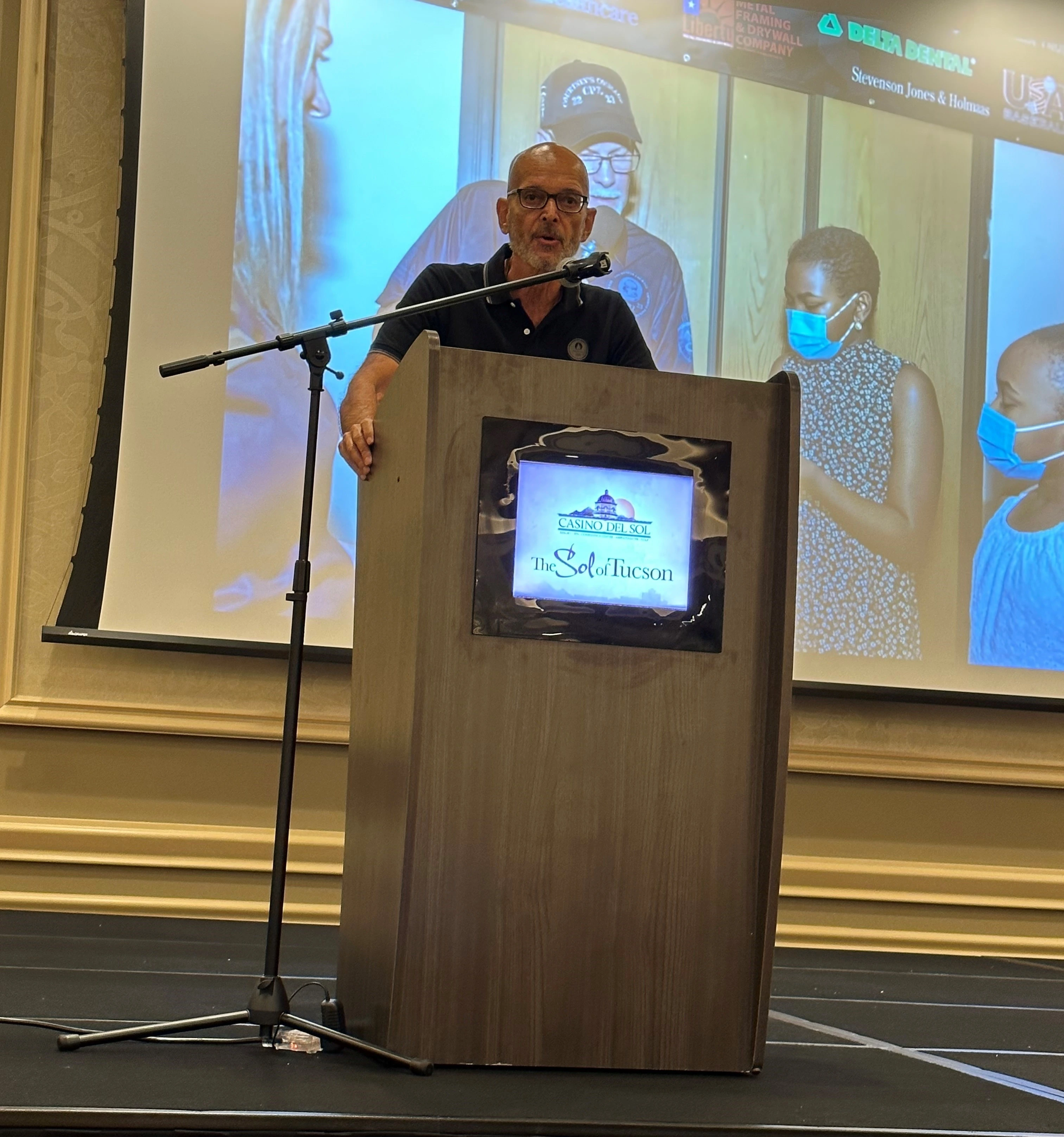 Dr. Katsanis at podium 